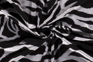 120511-tricot-stof-bedrukt-zebraprint-zwart-grijs-18105-069-tricot-stof-bedrukt-zebraprint-zwart-grijs-18105-069.png