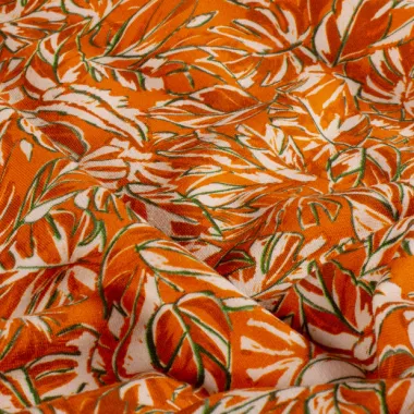 -Tricot stof - French Terry - bladeren - oranje - 24522-036 - Tricot stof - French Terry - bladeren - oranje - 24522-036