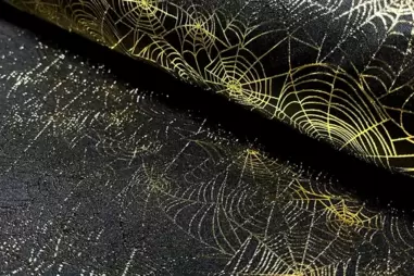 Tricot kinderstoffen - Tricot stof - Halloween spinnenweb goud folie - 20848-069