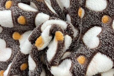 Bruine stoffen - Fleece stof - ultra soft - harten - bruin/gebroken wit/oranje - B309