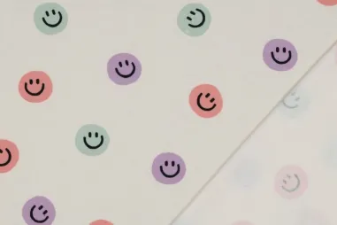 By Poppy - Flanel stof - happy faces - gebroken wit - 6510-001