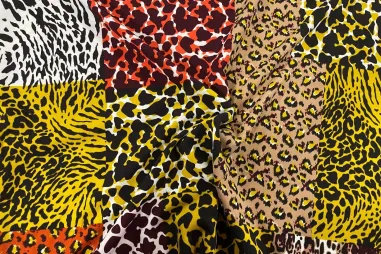 Uitverkoop - Stretch stof - dierenprint - geel multi - 16620-570