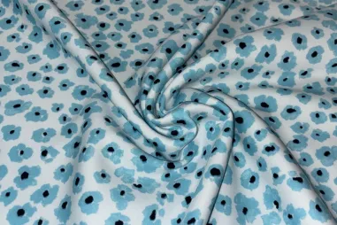 Uitverkoop - Tricot stof - bloemetjes - blauw - JT109