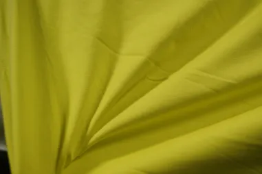 Katoen met elastan stoffen - Tricot stof - uni - geel - 5438-035