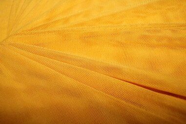 Laagjes kleding stoffen - Polyester stof - Mesh - okergeel - 0695-570