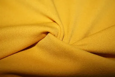 Tricot stoffen - Tricot stof - light scuba crepe - oker - 0692-575