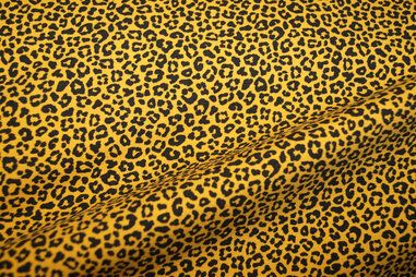 Okergele stoffen - Tricot stof - kleine dierenprint - oker - 1375-033