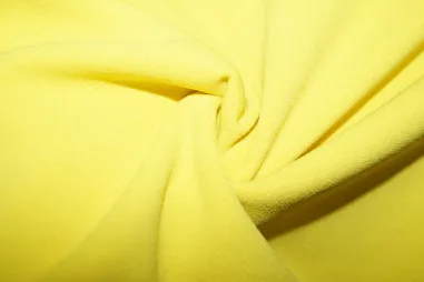 220gr/M² - Tricot stof - scuba light - geel - 0692-314